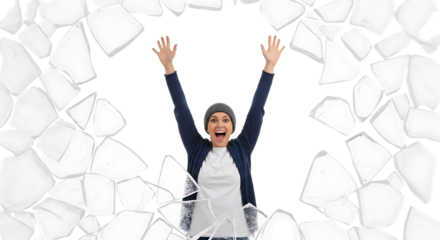 Young woman with arms raised in celebration, wearing a beanie and jacket, with a border of ice shards around her, isolated transparent