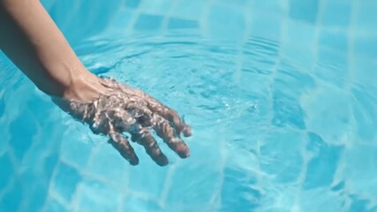 ASMR video capturing the calming sound of gentle water splashes in a serene swimming pool
