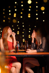  Friends having fun clinking glasses with beer