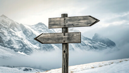 Wooden signpost in snowy mountains indicating different directions