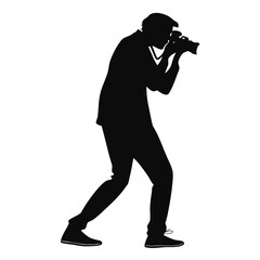 Photographer holding vintage camera silhouette