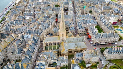 Aerial view of Saint-Malo, Brittany, France. Historic walled city on the English Channel with sandy...