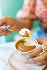Small container of colorful and fruity artisanal ice cream. Decorated in pastel tones.