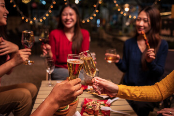 group of people celebrating with champagne