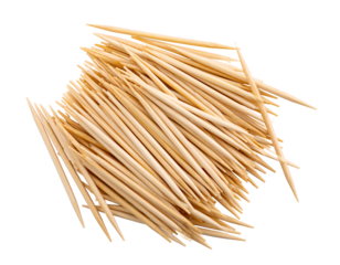 A large pile of wooden toothpicks arranged haphazardly on a clean , showcasing their pointed tips and natural color.