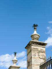 Stone Pillars Topped with Pineapple Finials