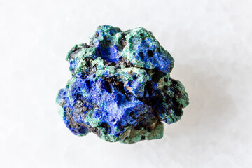 uncut azurite and malachite mineral on white