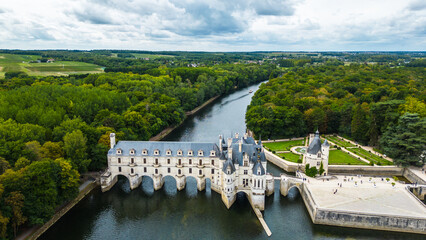 Aerial view of Ch&acirc;teau de Chenonceau, one of the most famous Loire Valley castles in France. Renaissance architecture spanning the River Cher, surrounded by lush forests and beautifully landscape