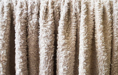 Close up of beige fabric texture background for interior or exterior design.