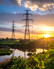 Power lines at sunset over a river