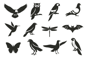 Obraz premium A collection of flying bird silhouettes, including sparrows and doves, is a beautiful vector illustration for your design