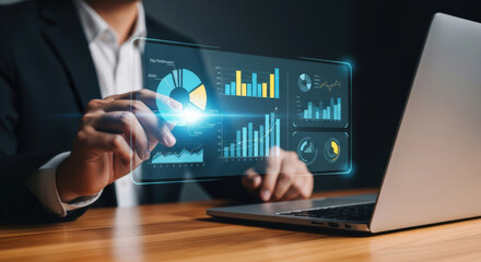 Interactive Data Visualization A Person Interacting with a Holographic Display of Business Analytics, Showcasing the Future of Data Analysis and Strategic Decision-Making
