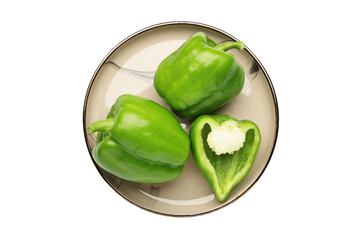 Green sweet pepper bell on plate isolated on white background.