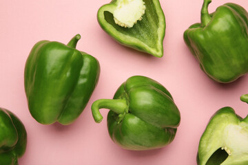 Green sweet pepper bell on pink background
