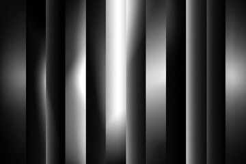 Obraz premium A grayscale design featuring vertical stripes with a gradient effect, creating a sophisticated and modern abstract background.