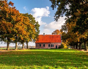 Autumnal farmhouse nestled in a tree-lined lane