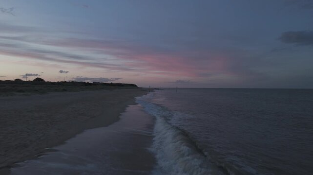 sunset flying over the beach drone ungraded