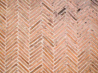 Suelo de ladrillo antiguo con forma de espiga