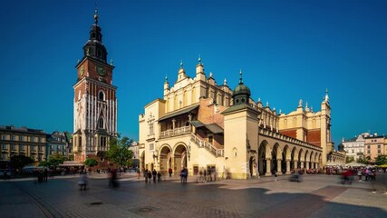 Krakows cloth hall and town hall tower stand majestically in the main square