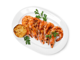 Tasty grilled shrimps with parsley and lemon isolated on white, top view. Delicious seafood dish