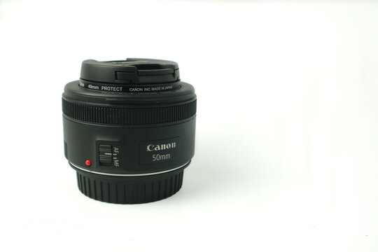 Canon 50mm f/1.8 STM lens on white background perfect for photography equipment marketing material