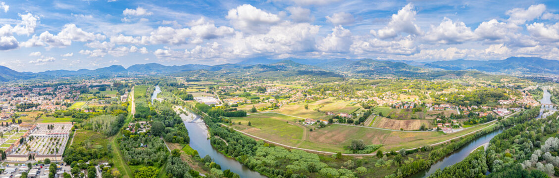 Lucca Tuscany beautiful aerial panorama at Serchio river and valley