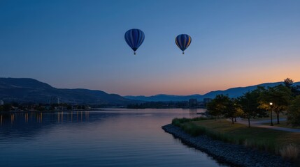 Fototapeta premium Serene Evening with Hot Air Balloons Over a Reflection in Deep Blue Waters