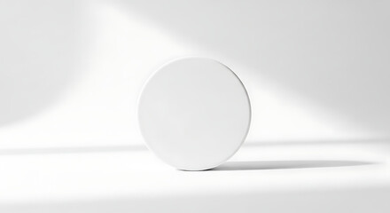 White Minimalist Circular Object with Soft Shadows on Clean Background