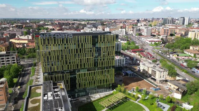 EUROPE, ITALY, MILAN 09,23,2025  NTT DATA and Loreal new building headquarter skyscrapers in downtown of Milan - Drone aerial view of skyline with new modern area and new companies in  Romolo district