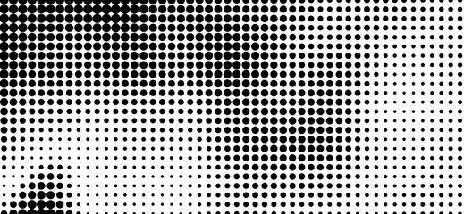 Halftone pattern in black and white showcases a gradient effect created by varying sizes and densities of circular dots, adding depth and texture to a stark design