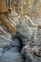 Close-up of a cave in the rock.