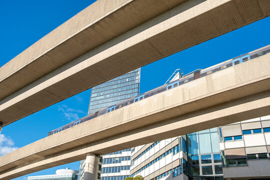 Metro viaducts crossing with dynamic geometric lines in Kista Stockholm, modern urban engineering perspective showing infrastructure efficiency and circulation systems