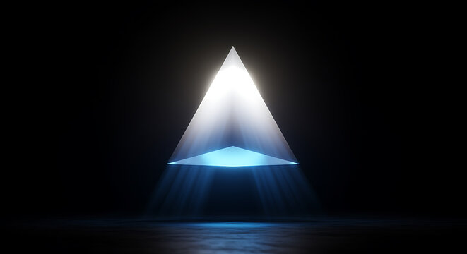 Glowing blue triangle illuminated by white spotlight in dark room