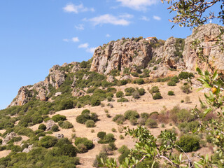 Fototapeta premium Thracian Meteora, Majestic rocky formations in the Thracian Meteora region, Greece. Stunning mountain scenery with unique cliffs, perfect for travel, photography, hiking, and eco-tourism exploration.