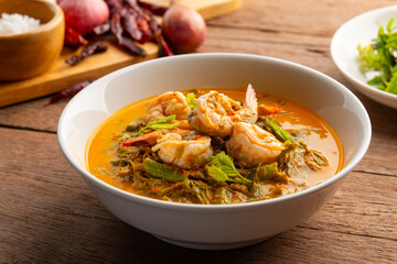 Tamarind Leaf Curry,Coconut Milk Curry with young Tamarind Leaves yardlong bean and shrimp in a bowl.Thai traditional food