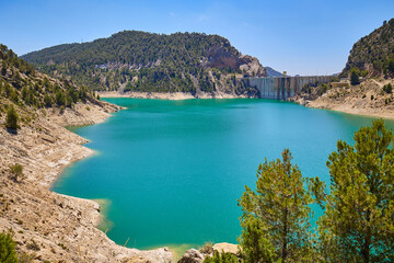 View from above of a reservoir with turquoise water