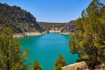 View from above of a reservoir with turquoise water