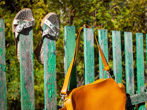 high heels on the fence - Powered by Adobe