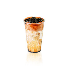 Cold bubble milk tea with brown sugar and tapioca pearls, isolated on white background