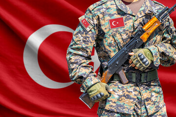 Fototapeta premium Turkey flag with soldier holding assault rifle