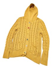 Yellow cable knit hooded cardigan with colourful floral buttons flat lay isolated on white background. Modern stylish women's clothes, autumn wardrobe, fall fashion, cotton yarn knitting, shopping 