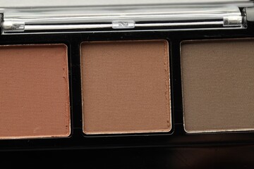 Beautiful eyeshadow palette as background, top view
