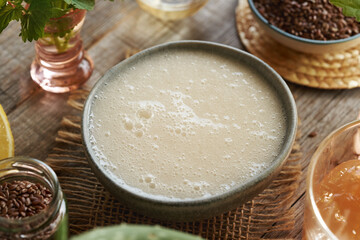 DIY shampoo made with homemade flax seed gel, apple cider vinegar, nettle leaves and coco glucoside.