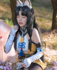 Enchanting anime character with fox ears and traditional Japanese attire in a serene outdoor...