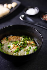 pho soup with duck breast and green peas