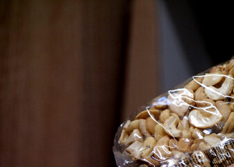 A Close-Up of a Plastic Package of Nuts in a Grocery Store
