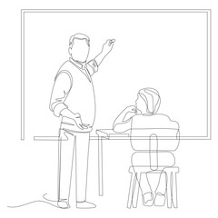 Teacher writing on blackboard with student sitting at desk in classroom education teaching