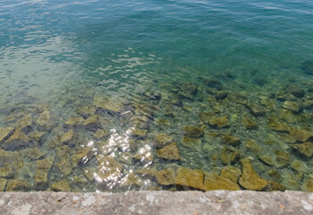reflections of the sun shining in the clear sea