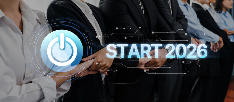 Diverse group of business professionals standing together, symbolizing teamwork and innovation while looking ahead to new opportunities and goals for 2026. Trope - Powered by Adobe