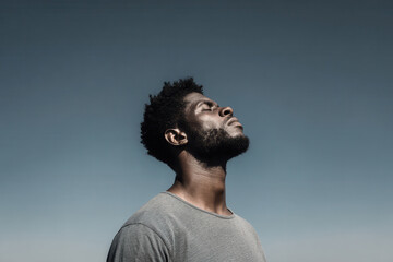 determined man battles against fierce wind feeling immense power of nature around him